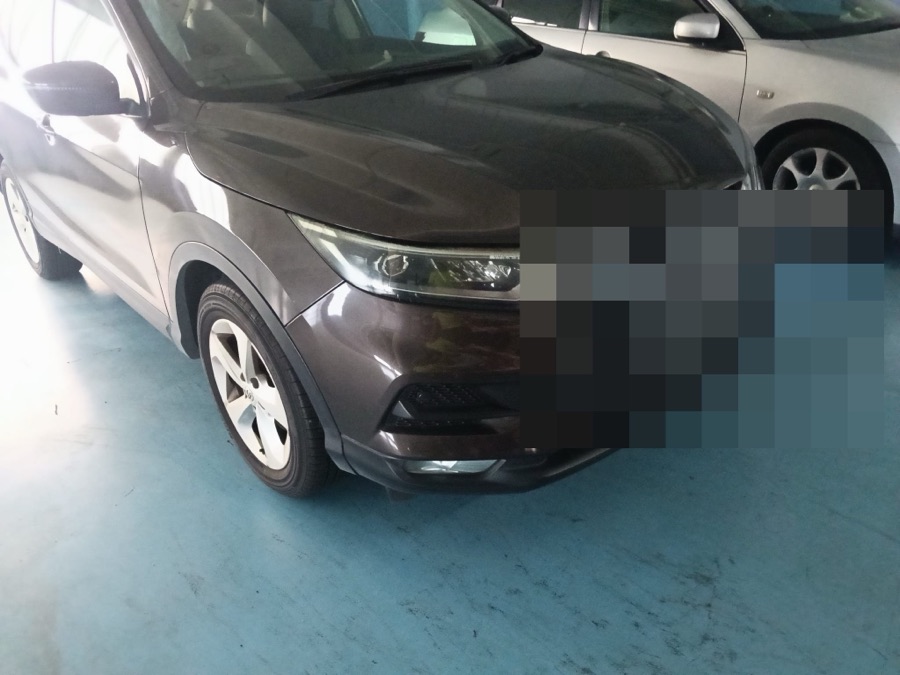 Nissan Qashqai SUV parked indoors, front view