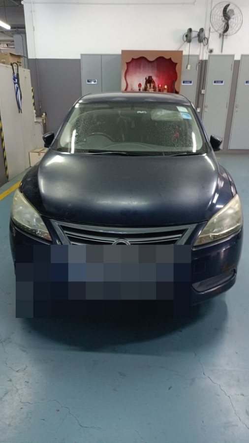 Nissan Sylphy parked at our Singapore workshop for servicing