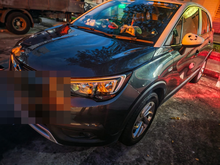 Dark grey Opel Crossland SUV at our Singapore workshop