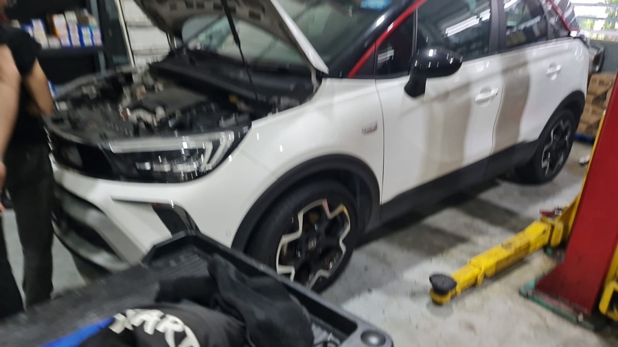Opel Crossland engine bay inspection at our Singapore workshop.