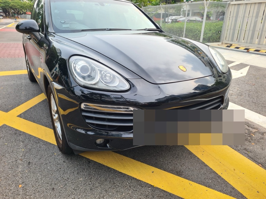 Porsche Cayenne S parked on the street