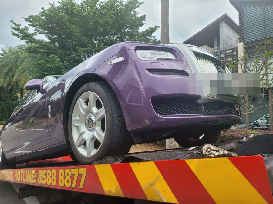 Rolls-Royce Ghost being towed in for repair at our Singapore workshop.