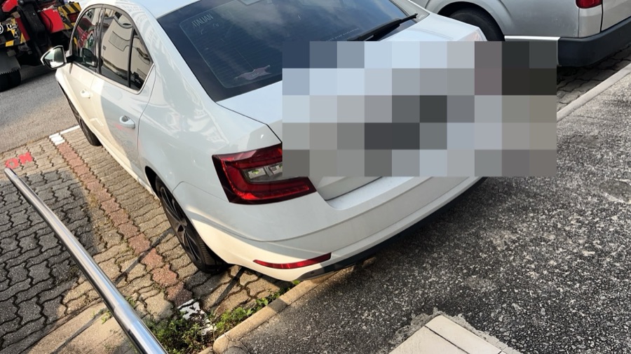 Skoda Octavia parked outdoors, rear view