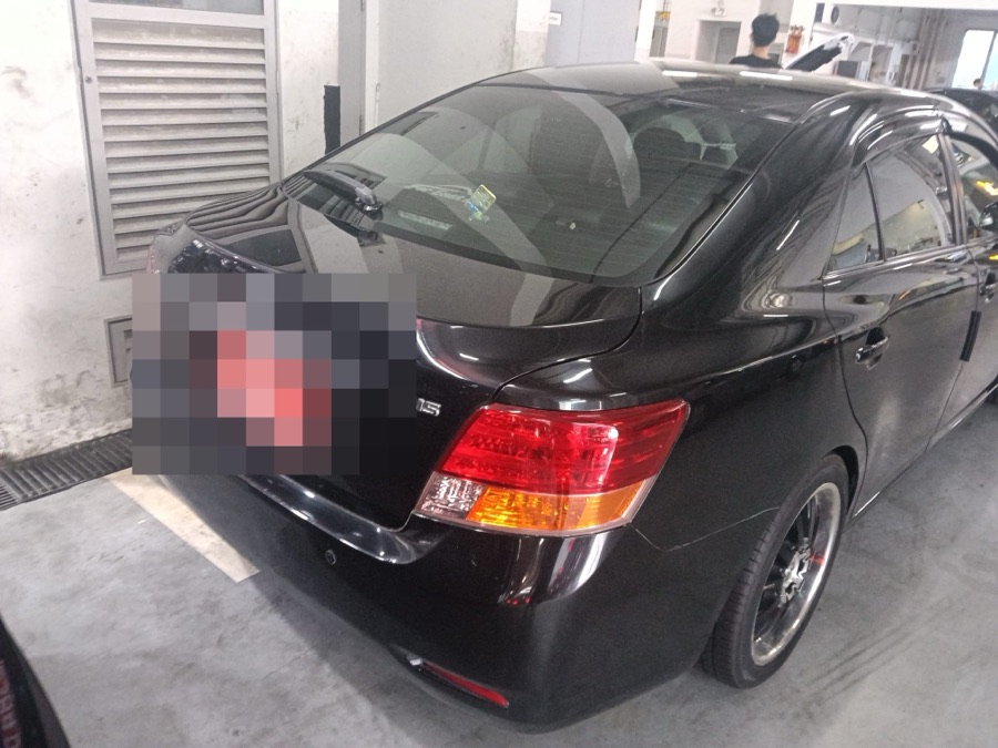 Toyota Corolla Axio sedan at our Singapore workshop