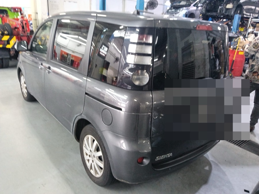 Toyota Sienta MPV rear view at our Singapore workshop