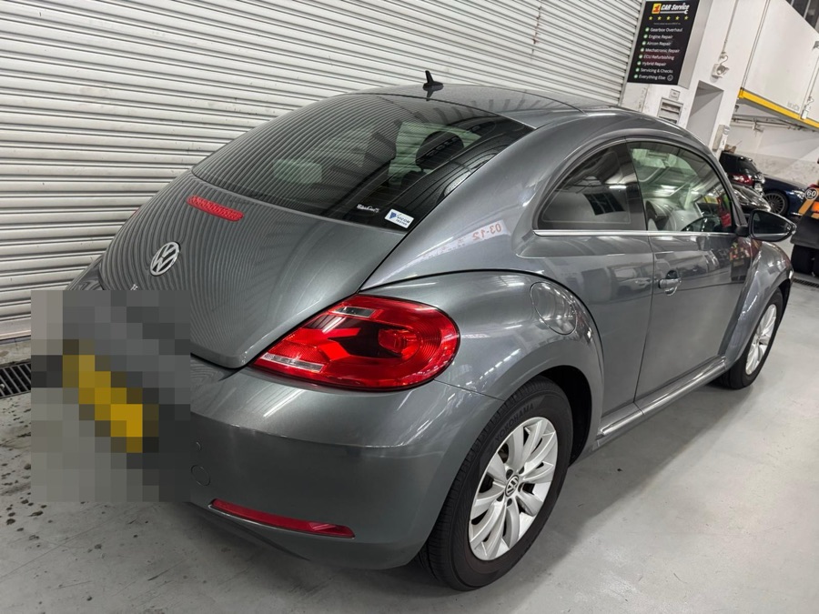 Volkswagen Beetle side view at our Singapore workshop