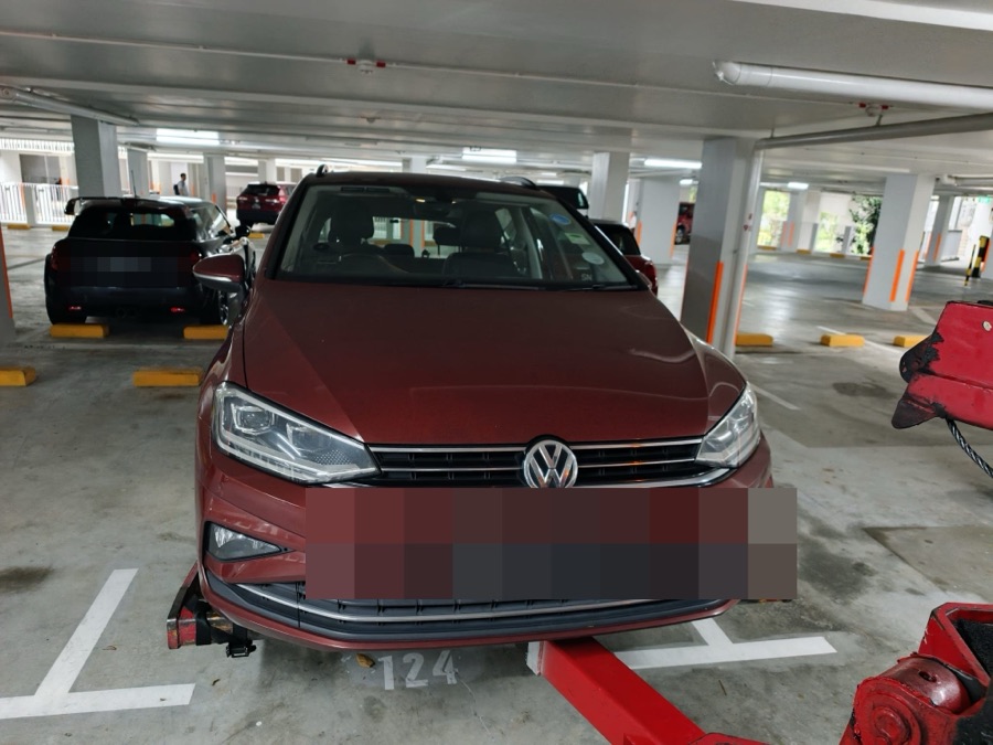 Volkswagen Golf Sportsvan being towed in for servicing