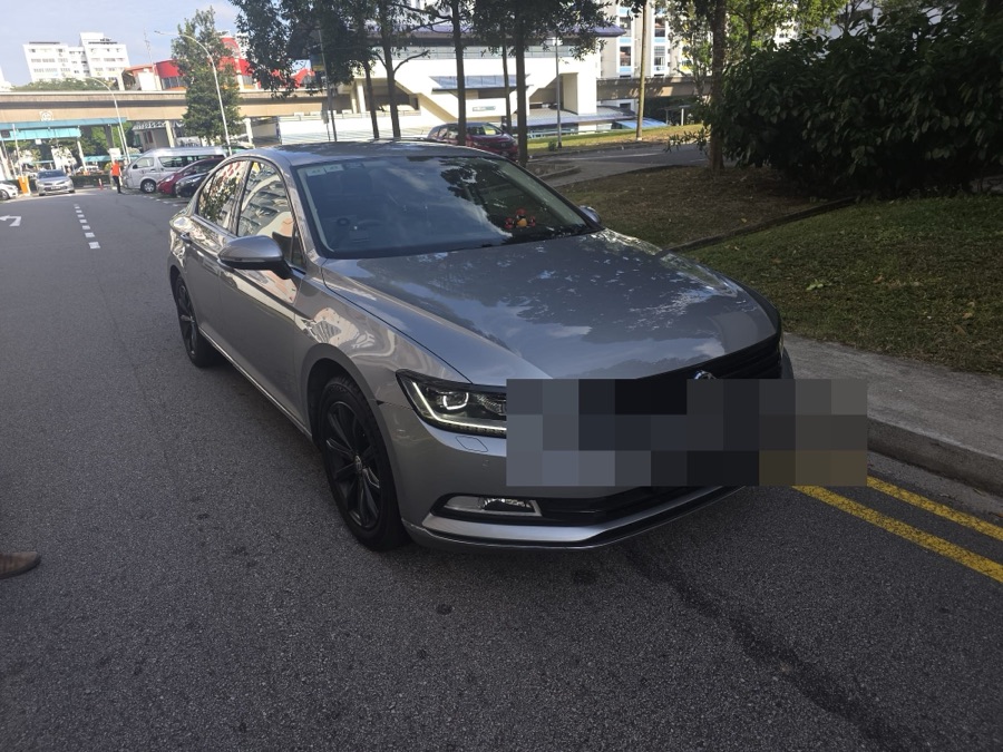 Volkswagen Passat parked ahead of workshop service