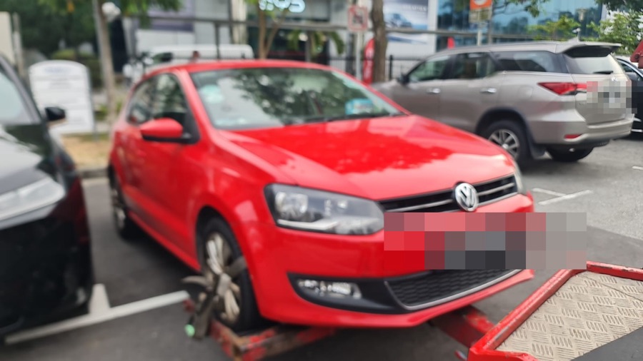 Volkswagen Polo being towed in for workshop service
