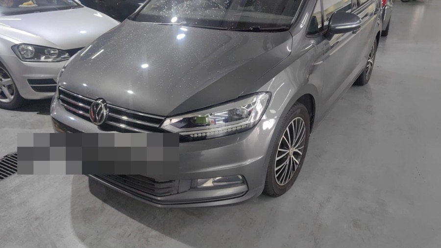 Volkswagen Touran in for servicing at our Singapore workshop.