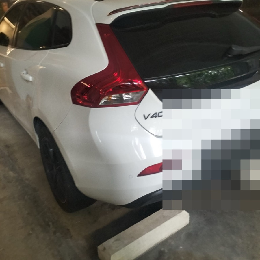 Volvo V40 up on jack stands for servicing at our Singapore workshop.